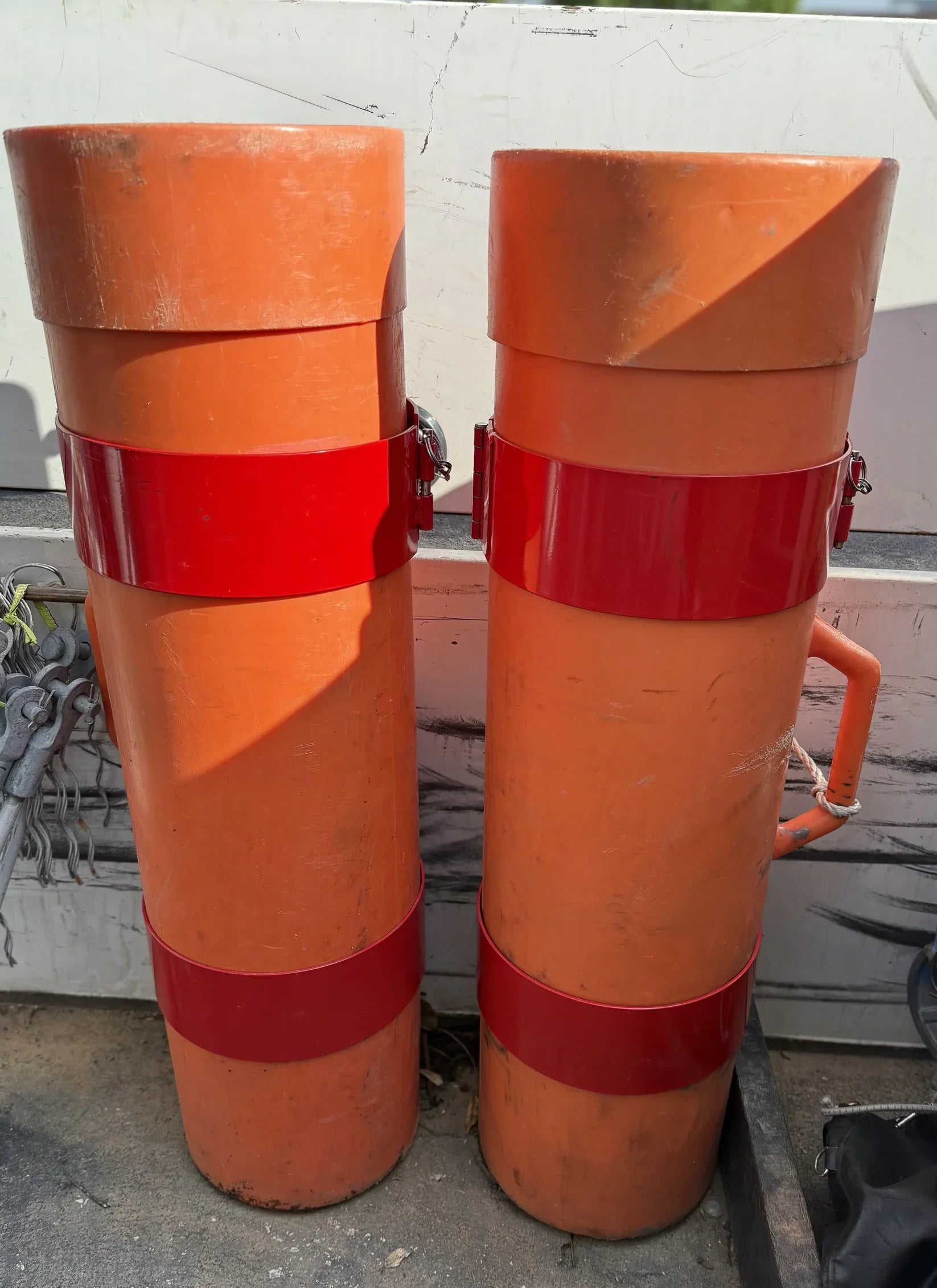 Insulating Blanket Canister Storage for Utility Bucket Trucks